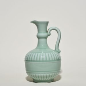 Qing Dynasty Yongzheng pink celadon glaze flower pouring