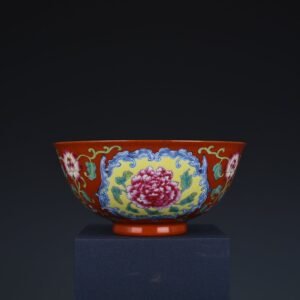 Qing Dynasty Yongzheng red ground consecrated enamel peony flower bowl