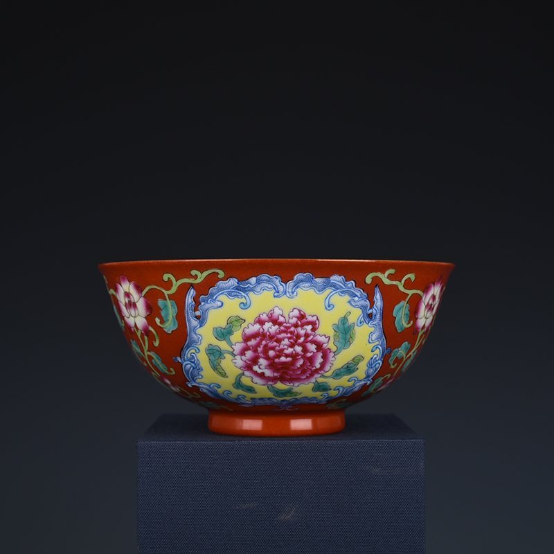 Qing Dynasty Yongzheng red ground consecrated enamel peony flower bowl