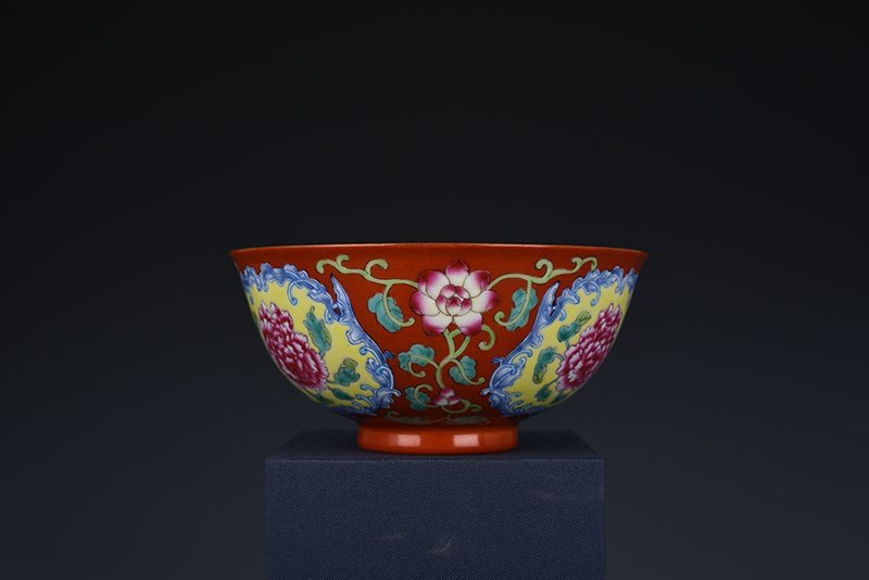 Qing Dynasty Yongzheng red ground consecrated enamel peony flower bowl