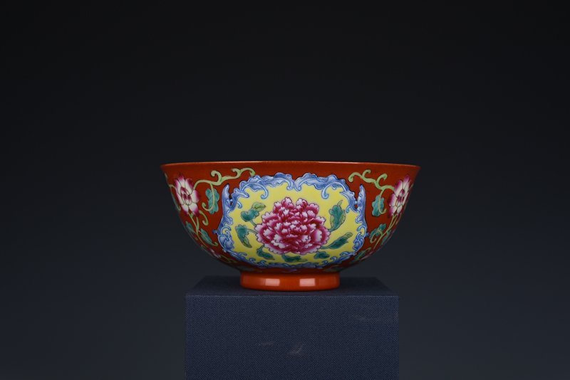 Qing Dynasty Yongzheng red ground consecrated enamel peony flower bowl