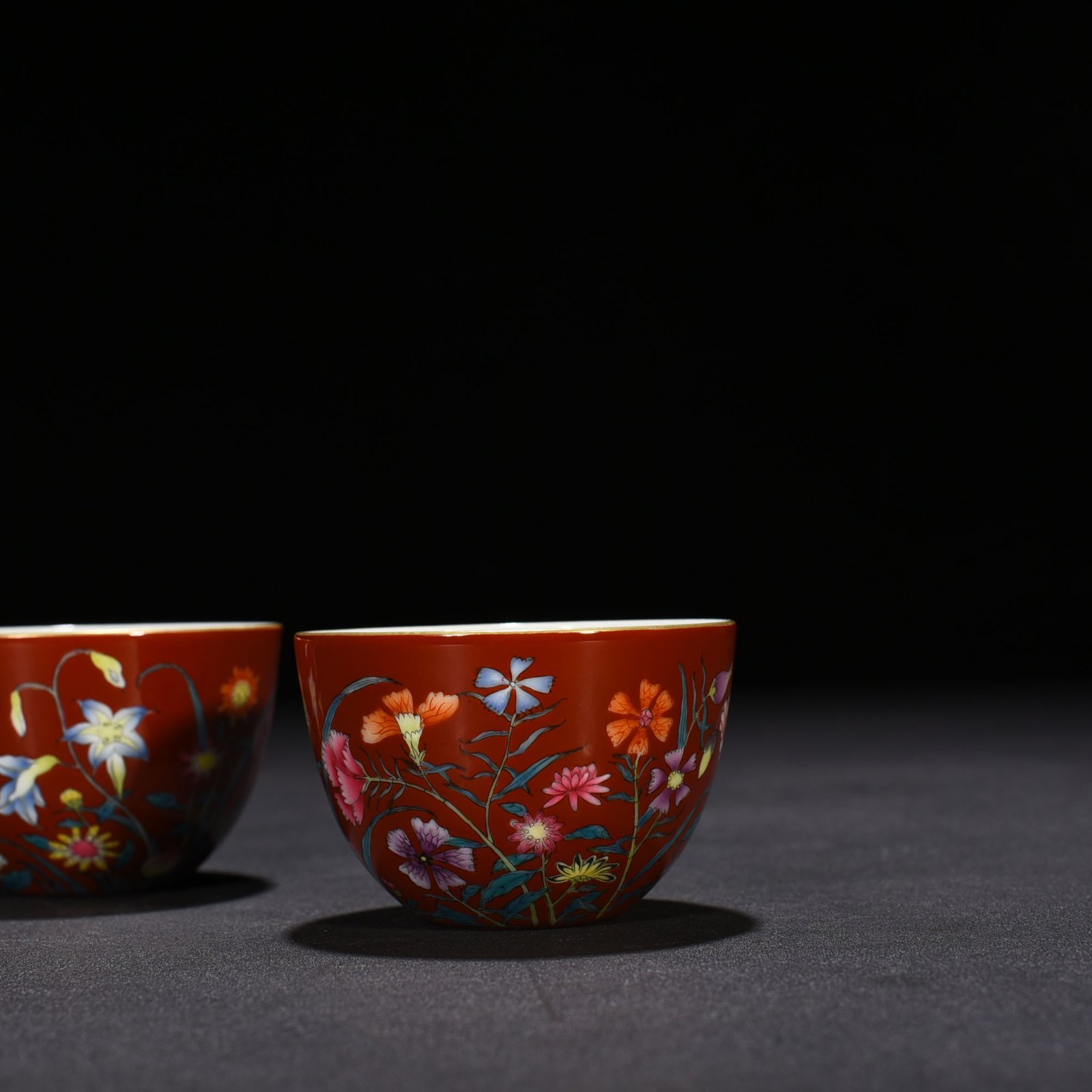 Qing Dynasty Yongzheng red ground pastel peony flower pattern lying foot cup vat cup