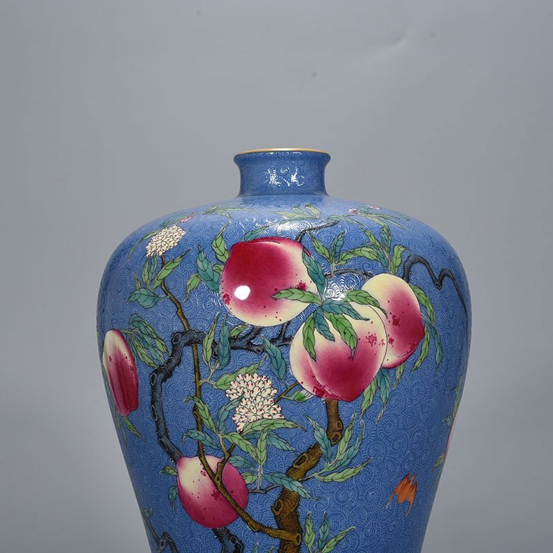 Qing Dynasty Yongzheng blue glaze rolled famille rose plum vase