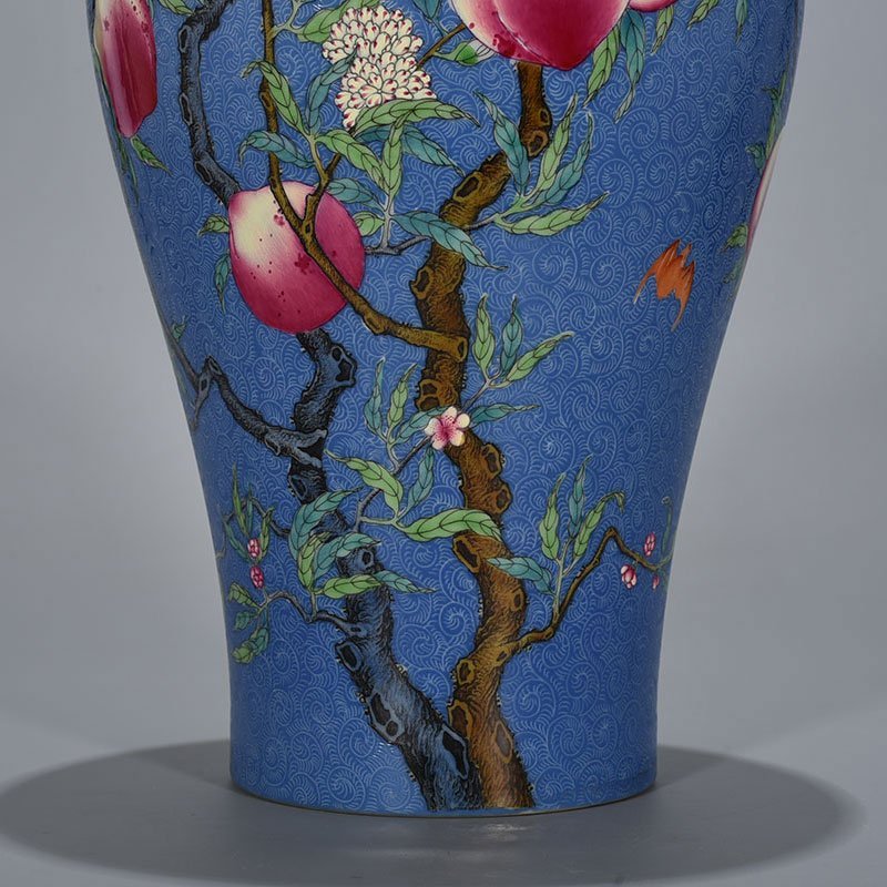 Qing Dynasty Yongzheng blue glaze rolled famille rose plum vase