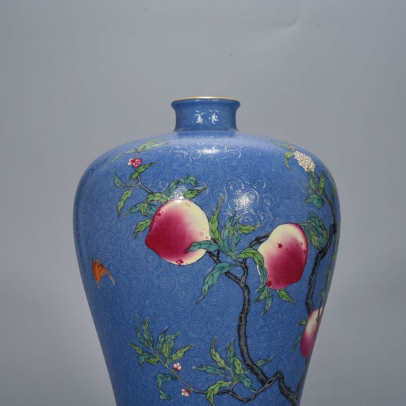 Qing Dynasty Yongzheng blue glaze rolled famille rose plum vase