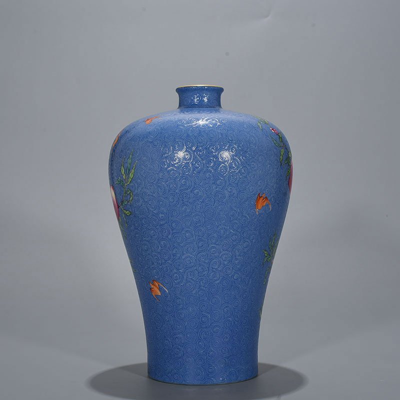 Qing Dynasty Yongzheng blue glaze rolled famille rose plum vase