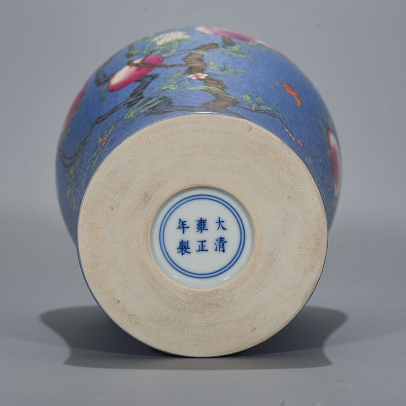 Qing Dynasty Yongzheng blue glaze rolled famille rose plum vase