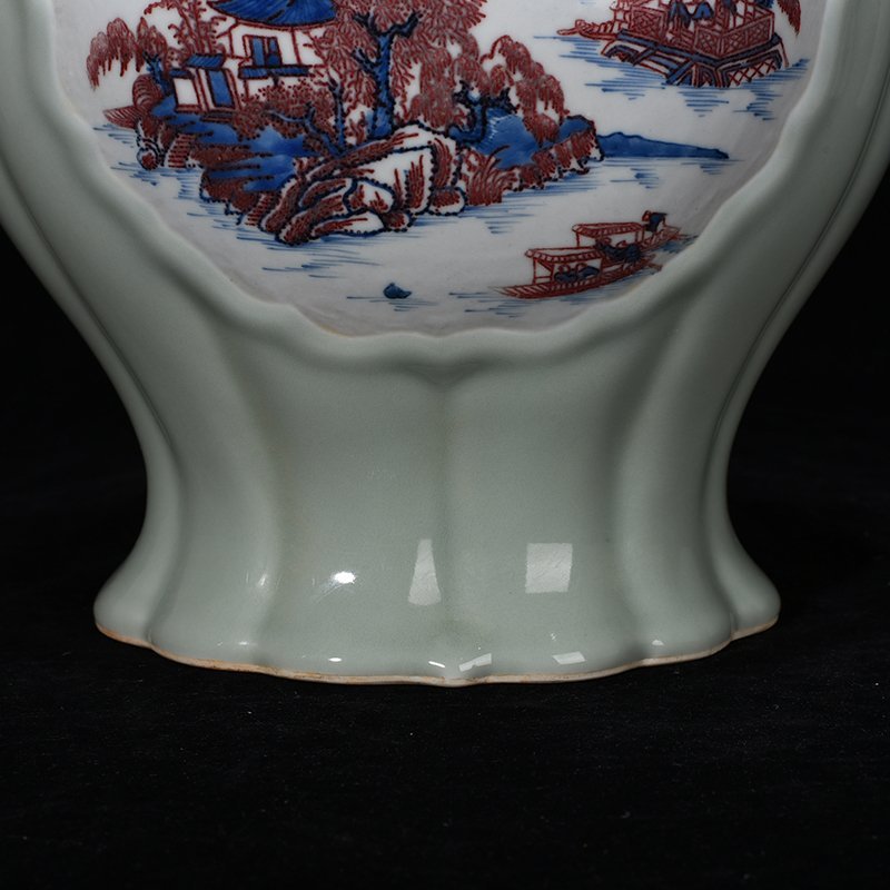 Qing Dynasty Yongzheng bean green glaze blue and white underglaze red mountain water bottle