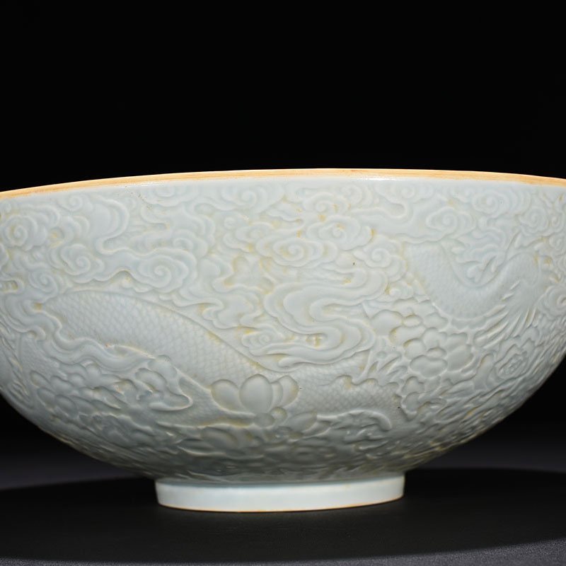 Qing Dynasty Yongzheng carved thin bowl with dragon