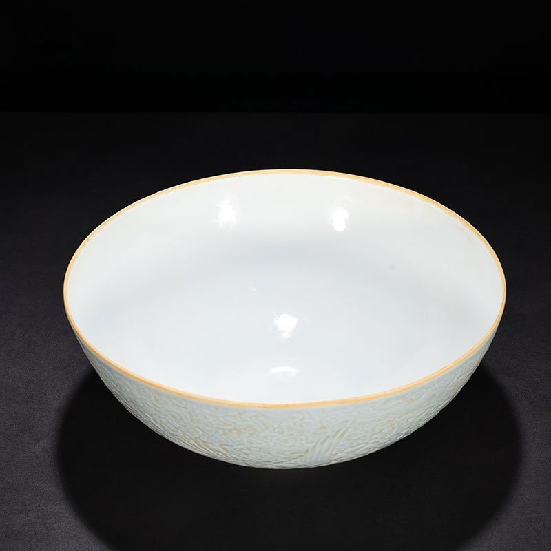 Qing Dynasty Yongzheng carved thin bowl with dragon