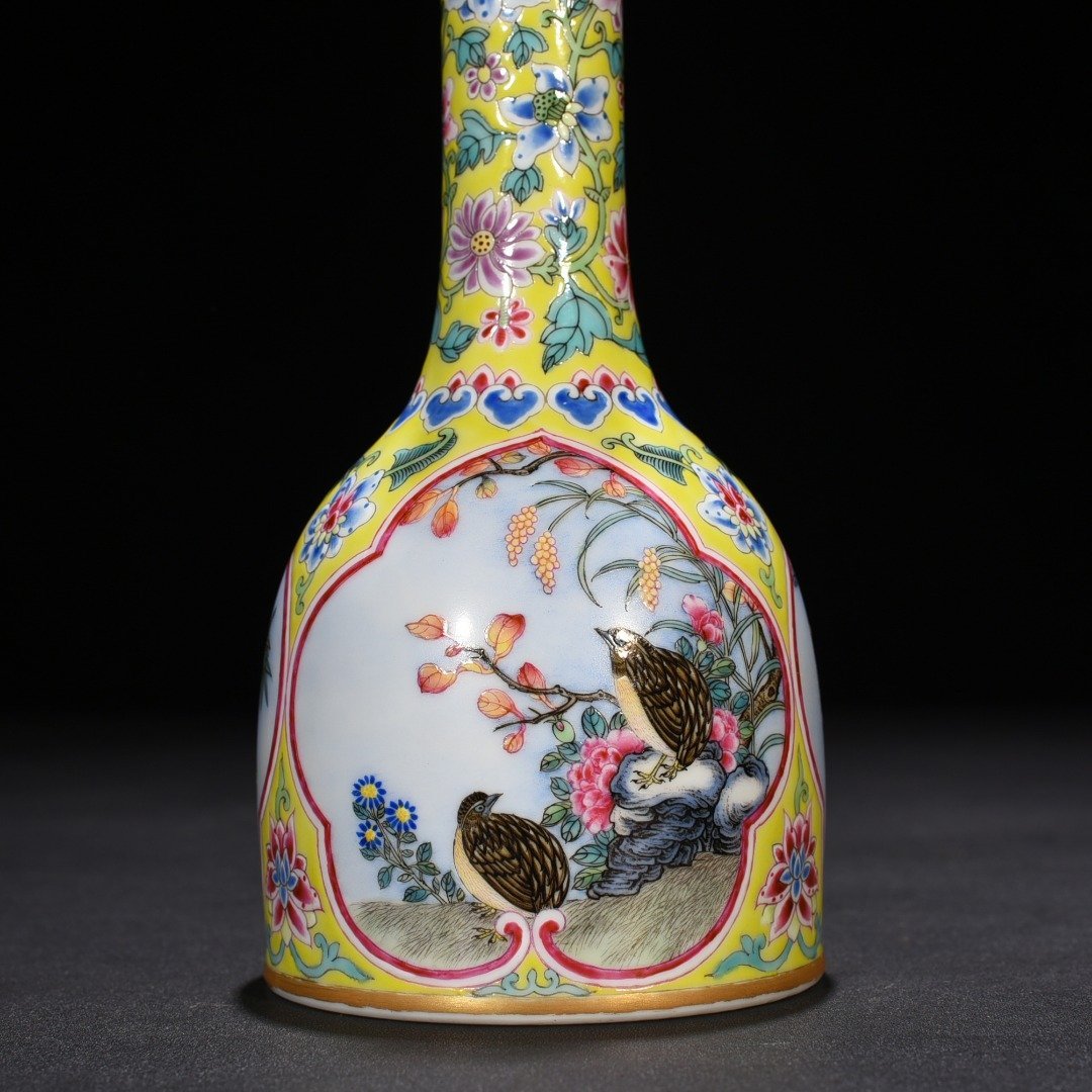 Qing Dynasty Yongzheng yellow ground windowed enamel rattle with flower
