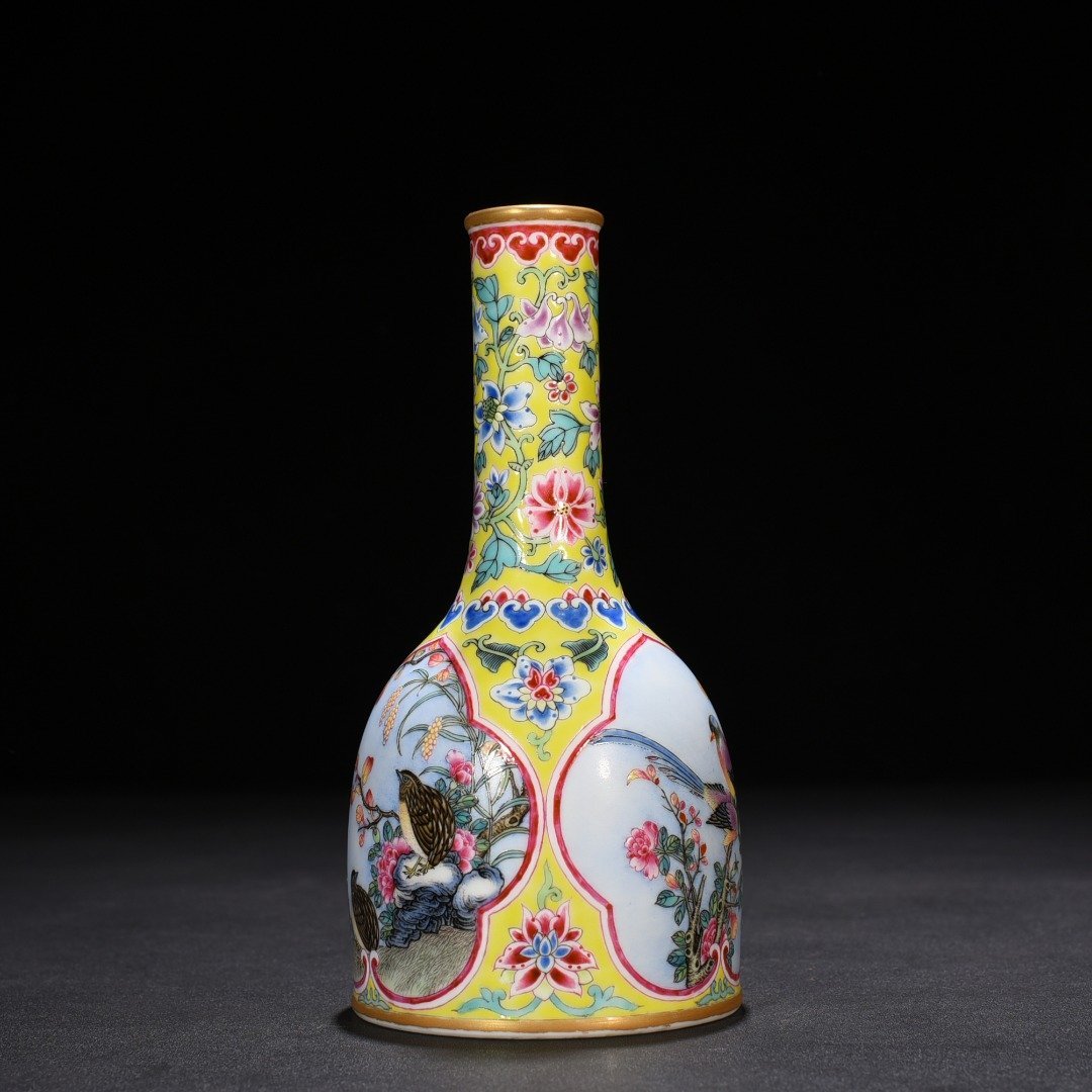 Qing Dynasty Yongzheng yellow ground windowed enamel rattle with flower