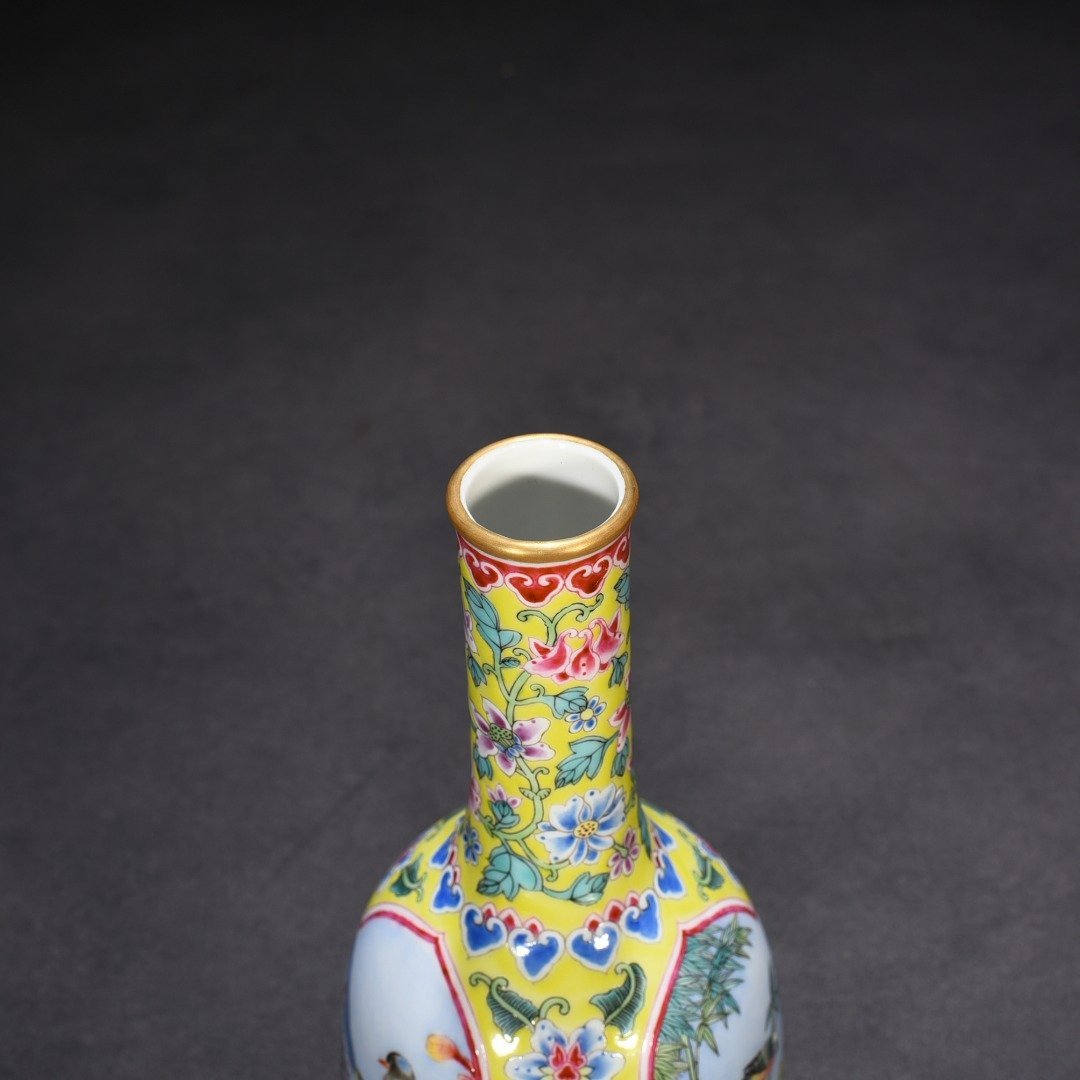 Qing Dynasty Yongzheng yellow ground windowed enamel rattle with flower