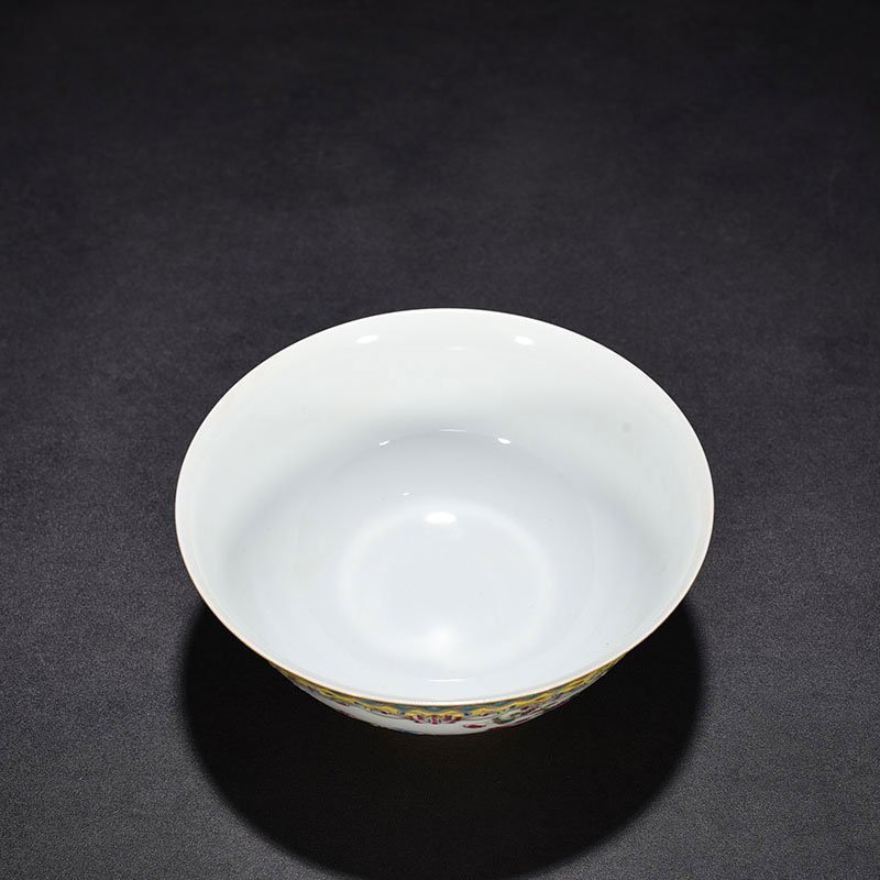 Qing Dynasty Yongzheng yellow ground pastel window flower and bird bowl