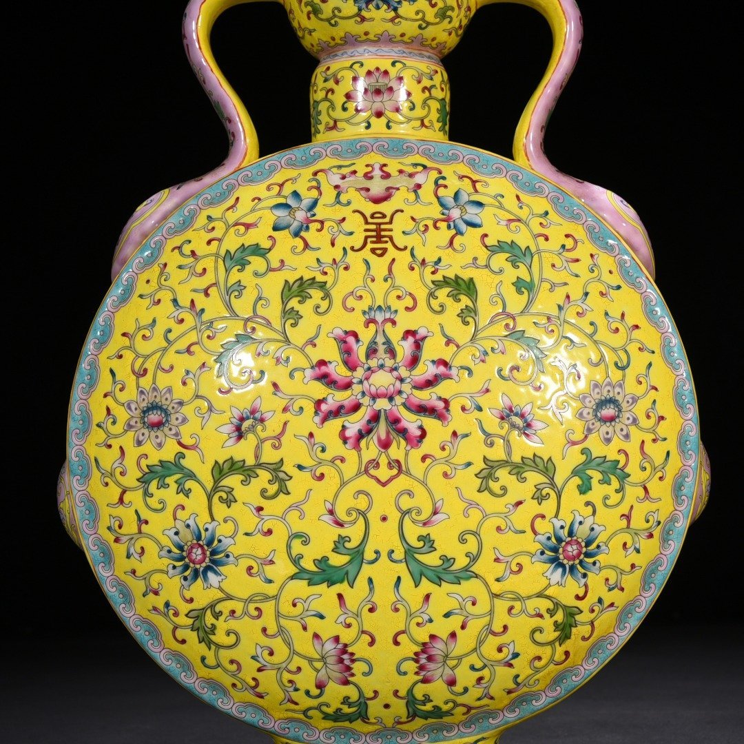 Qing Dynasty Yongzheng yellow ground pastel lucky and longevity flower pattern Ruyi ear flat vase