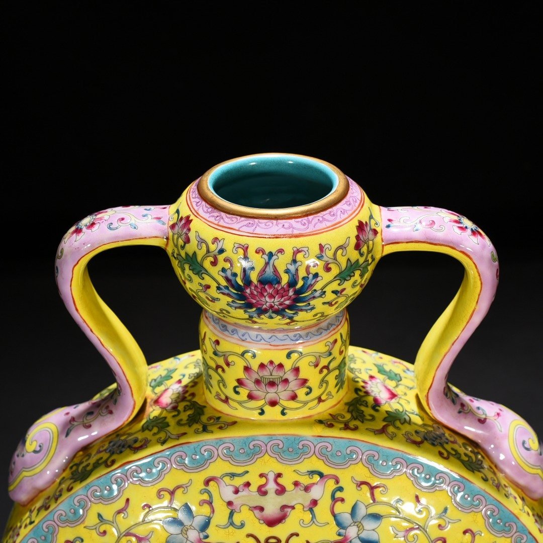 Qing Dynasty Yongzheng yellow ground pastel lucky and longevity flower pattern Ruyi ear flat vase