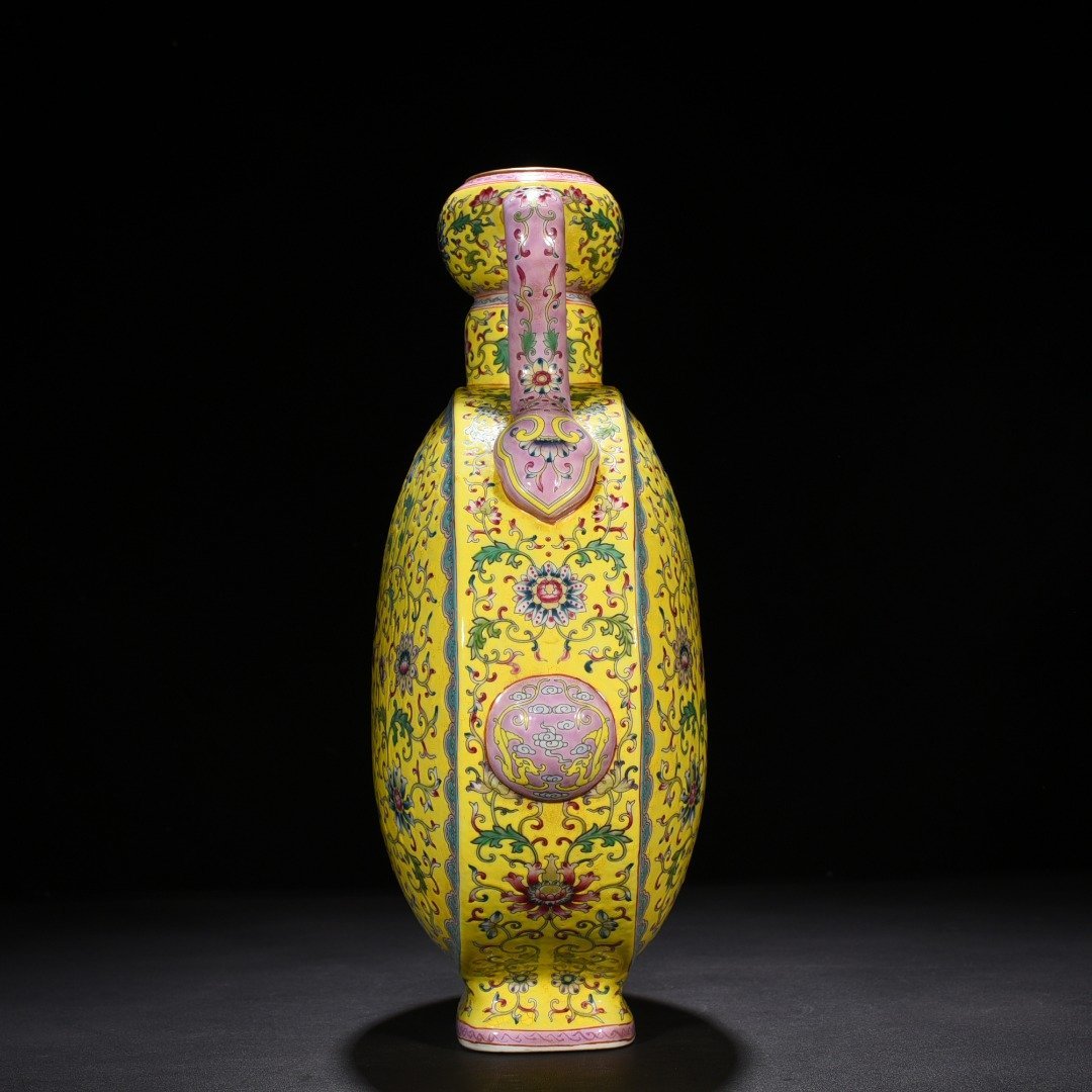 Qing Dynasty Yongzheng yellow ground pastel lucky and longevity flower pattern Ruyi ear flat vase