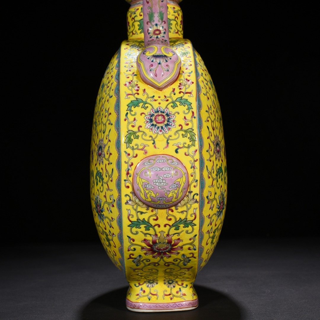 Qing Dynasty Yongzheng yellow ground pastel lucky and longevity flower pattern Ruyi ear flat vase