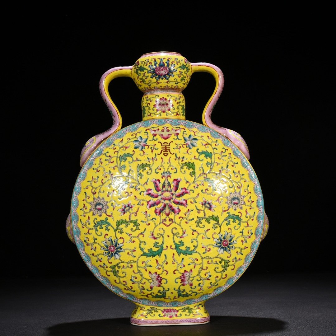 Qing Dynasty Yongzheng yellow ground pastel lucky and longevity flower pattern Ruyi ear flat vase