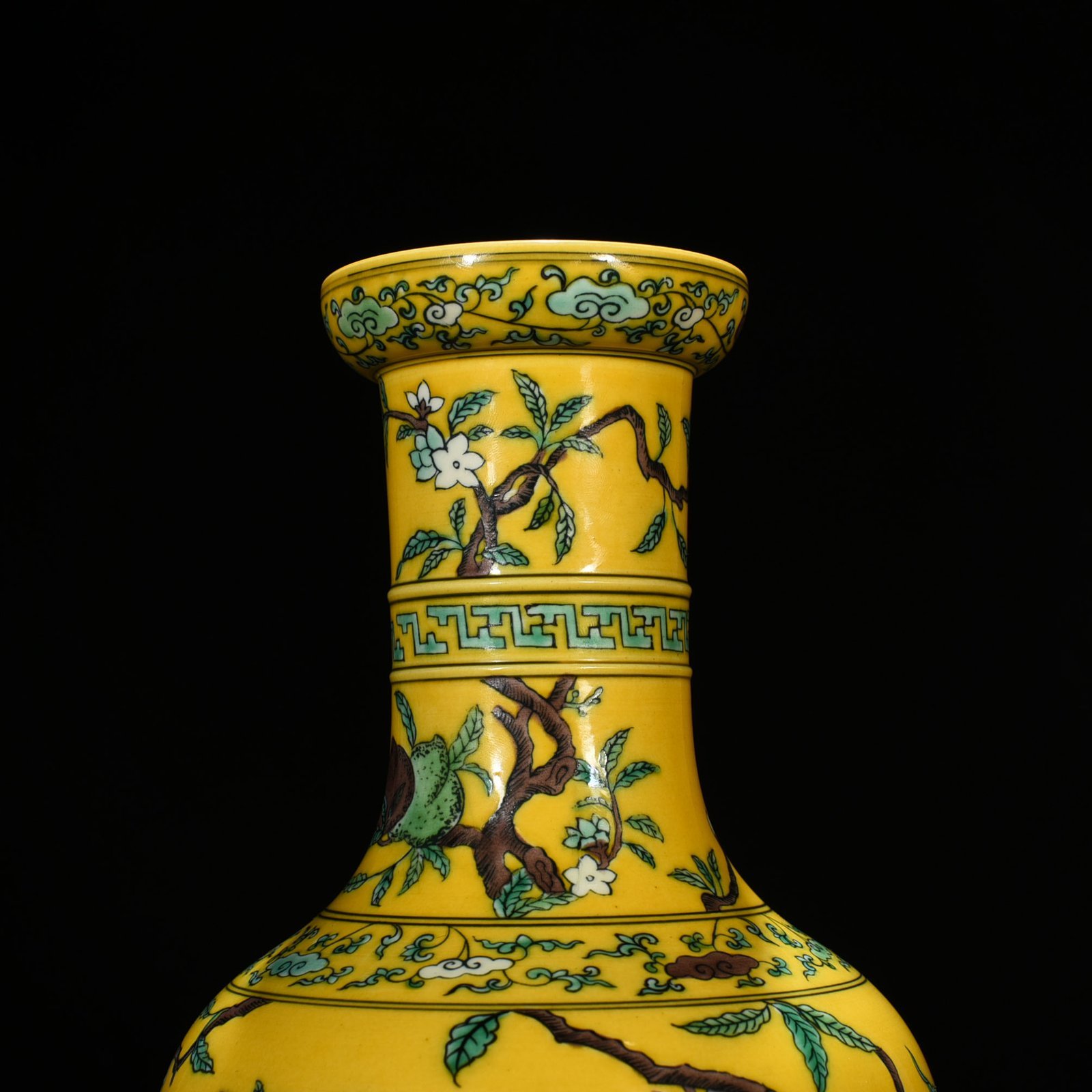 Qing Dynasty Yongzheng yellow ground three-color five-blessing and nine-peach bottle