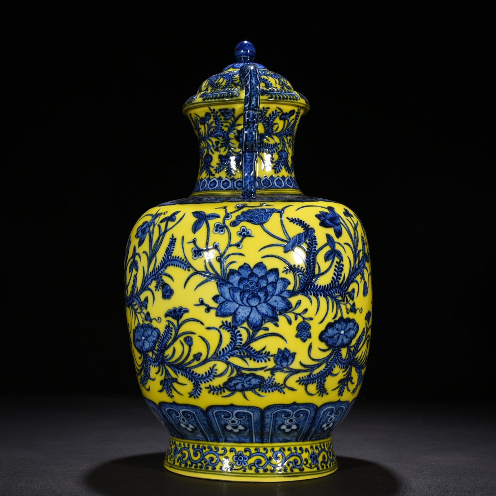 Qing Dynasty Yongzheng yellow ground blue and white lotus pattern double-eared statue