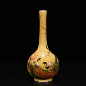 Qing Dynasty Yongzheng yellow glaze pastel peacock flower pattern bile vase