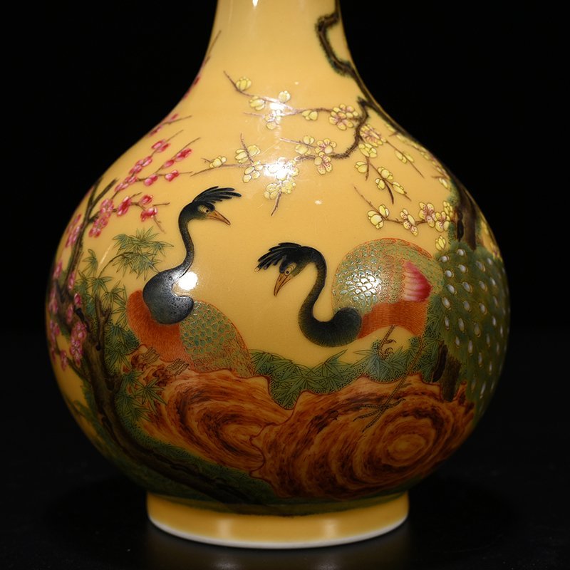 Qing Dynasty Yongzheng yellow glaze pastel peacock flower pattern bile vase