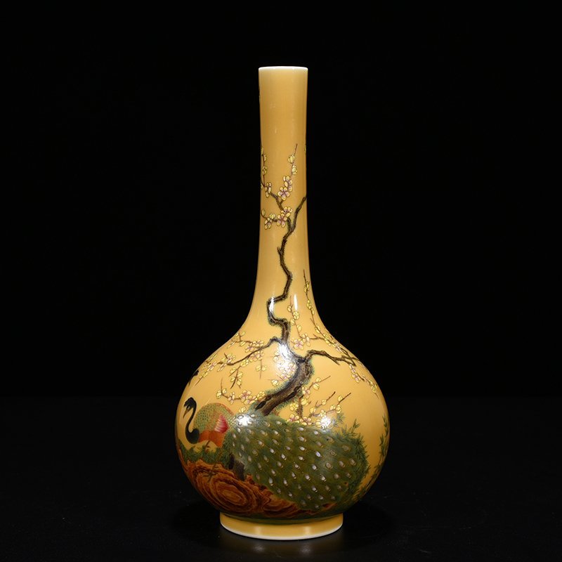 Qing Dynasty Yongzheng yellow glaze pastel peacock flower pattern bile vase