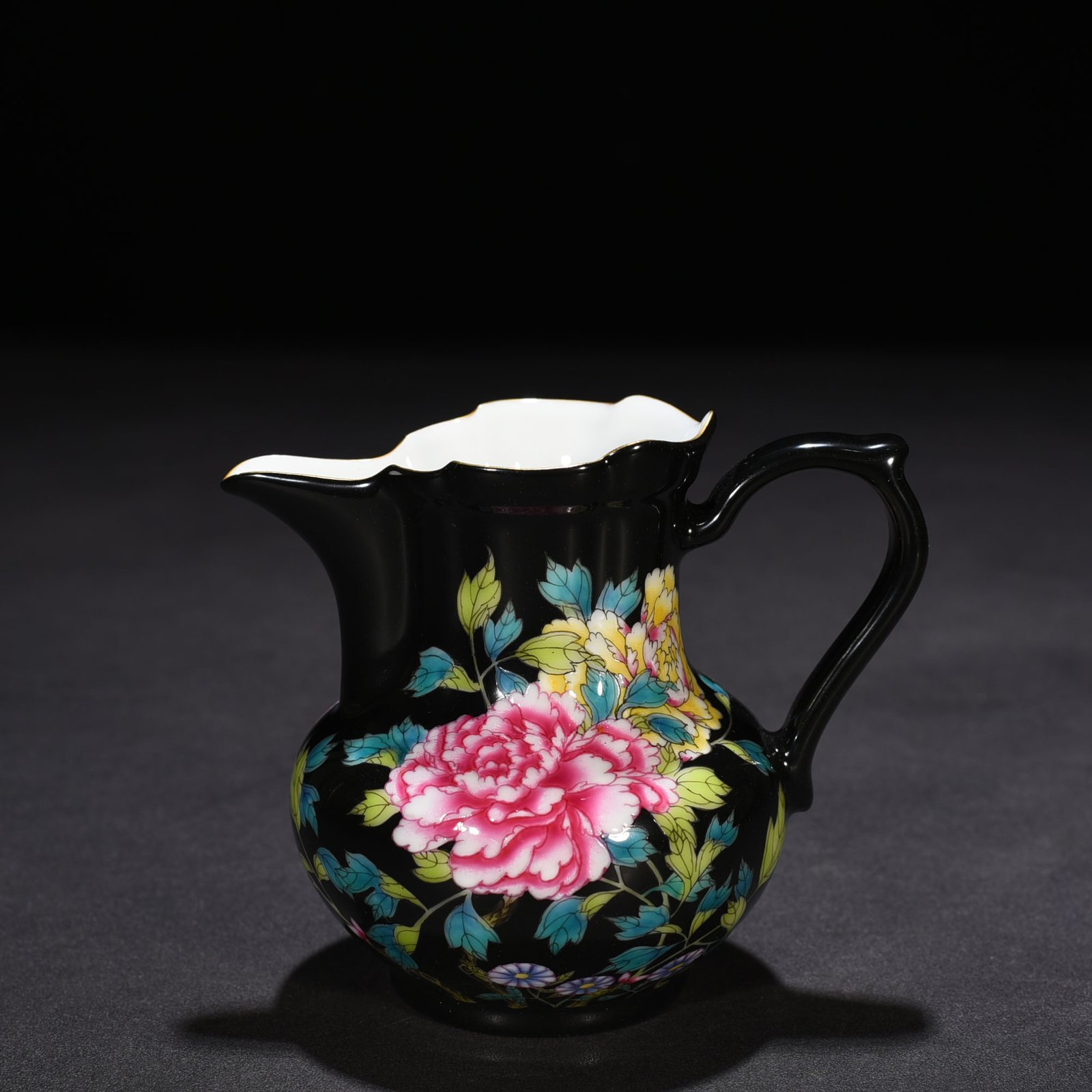Qing Dynasty Yongzheng black ground enamel peony pattern monk’s hat tea dispenser
