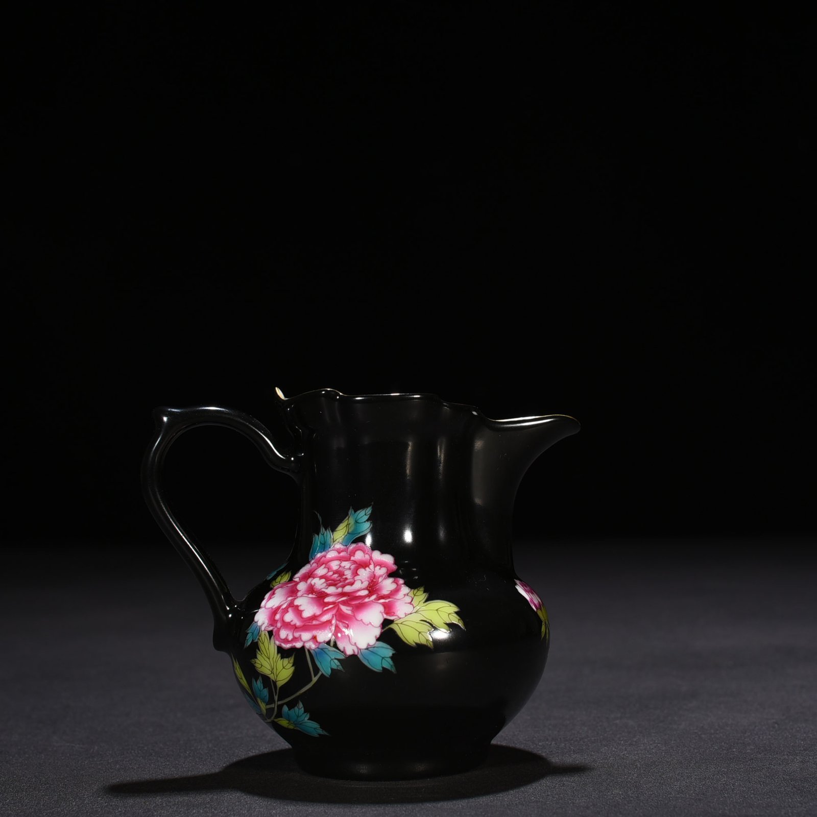 Qing Dynasty Yongzheng black ground enamel peony pattern monk’s hat tea dispenser