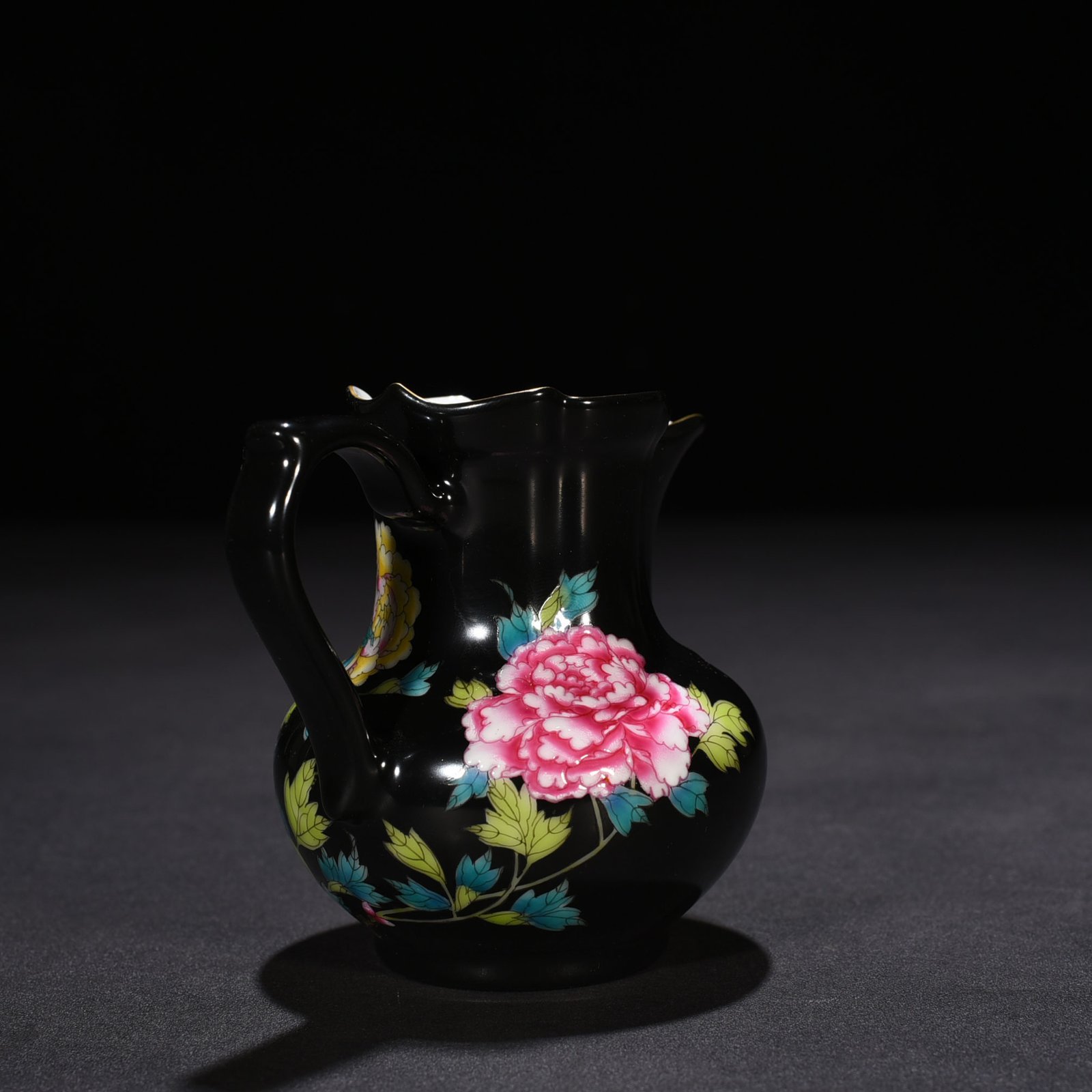 Qing Dynasty Yongzheng black ground enamel peony pattern monk’s hat tea dispenser