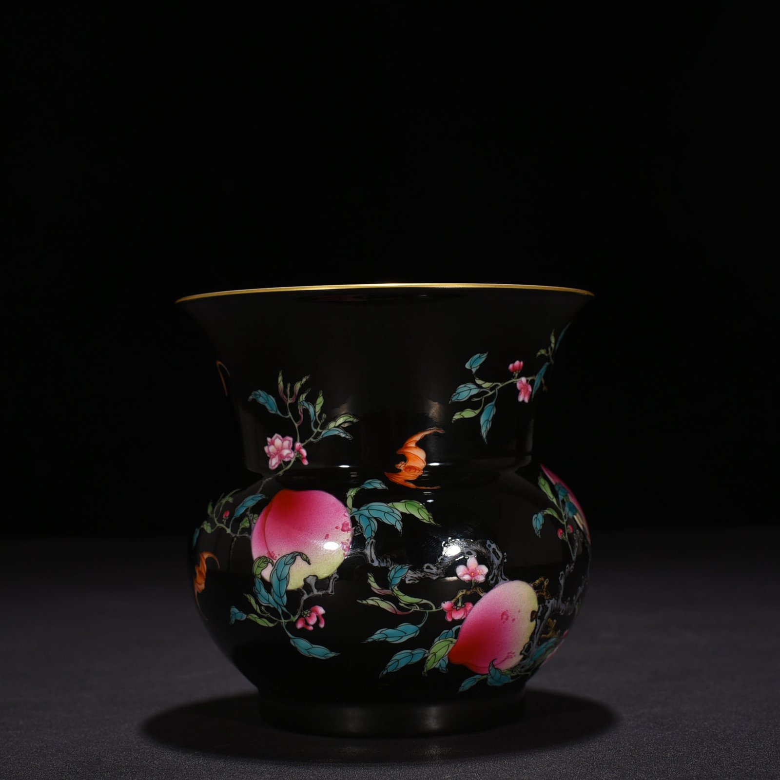 Qing Dynasty Yongzheng black ground pastel five blessings and nine peach patterns slag bucket