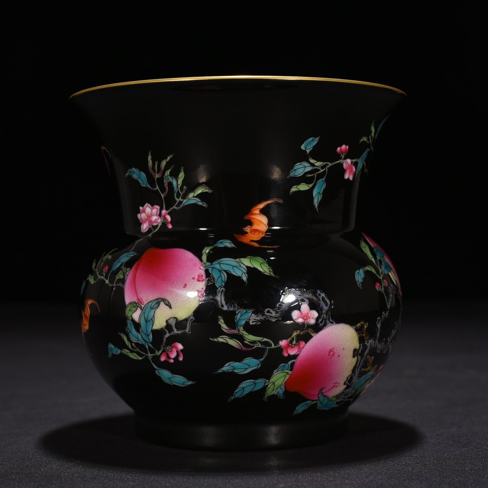 Qing Dynasty Yongzheng black ground pastel five blessings and nine peach patterns slag bucket