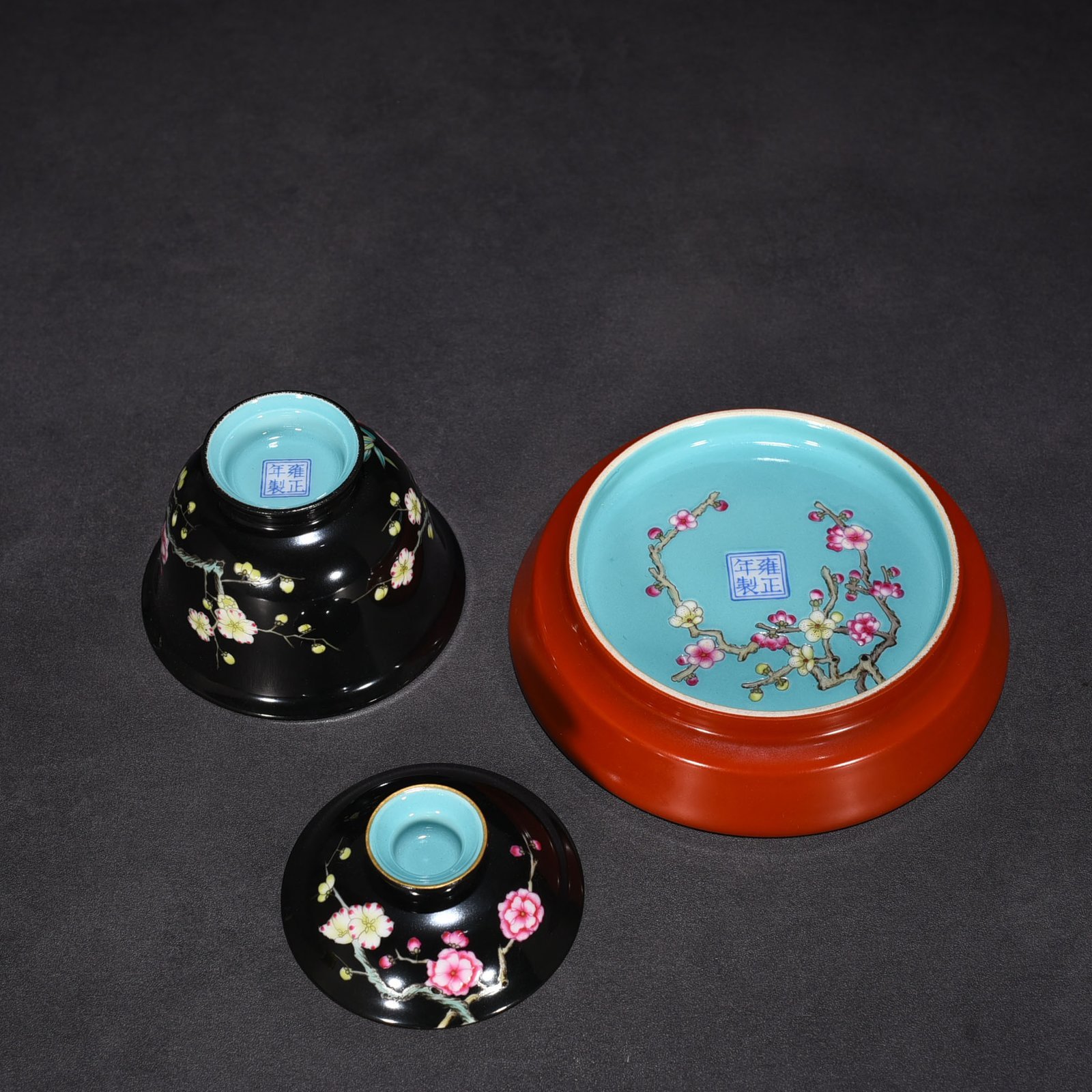 Qing Dynasty Yongzheng black ground pastel plum blossom pattern covered bowl