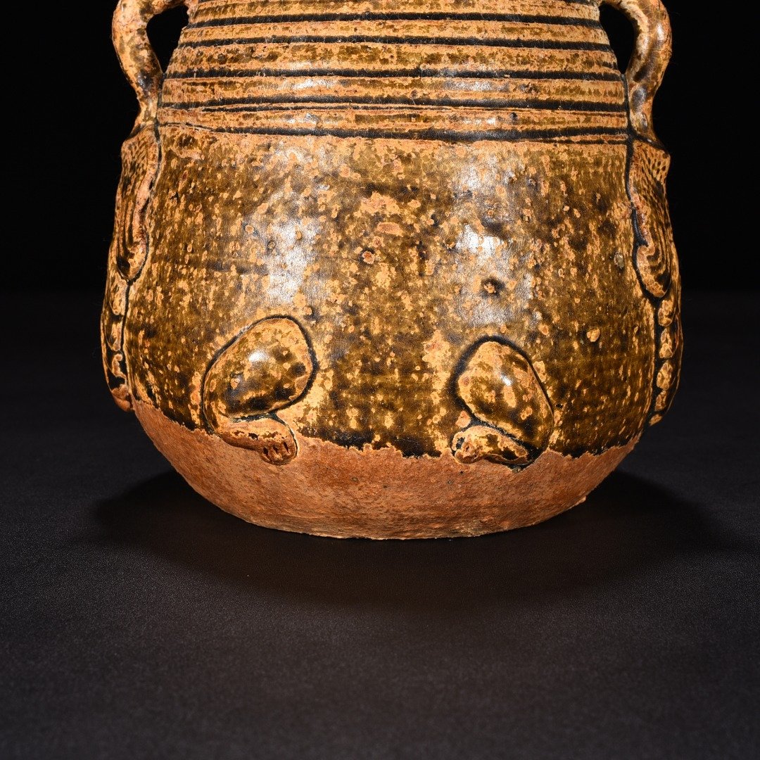 Jin Dynasty Yue kiln celadon animal faces and ears vase