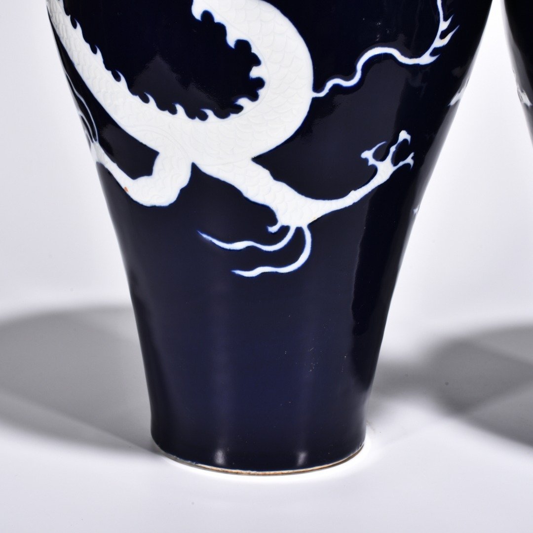 Yuan Dynasty Ji blue glaze white plum vase engraved with cloud and dragon pattern