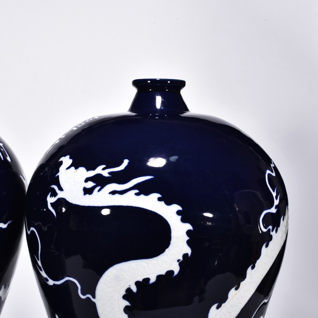 Yuan Dynasty Ji blue glaze white plum vase engraved with cloud and dragon pattern
