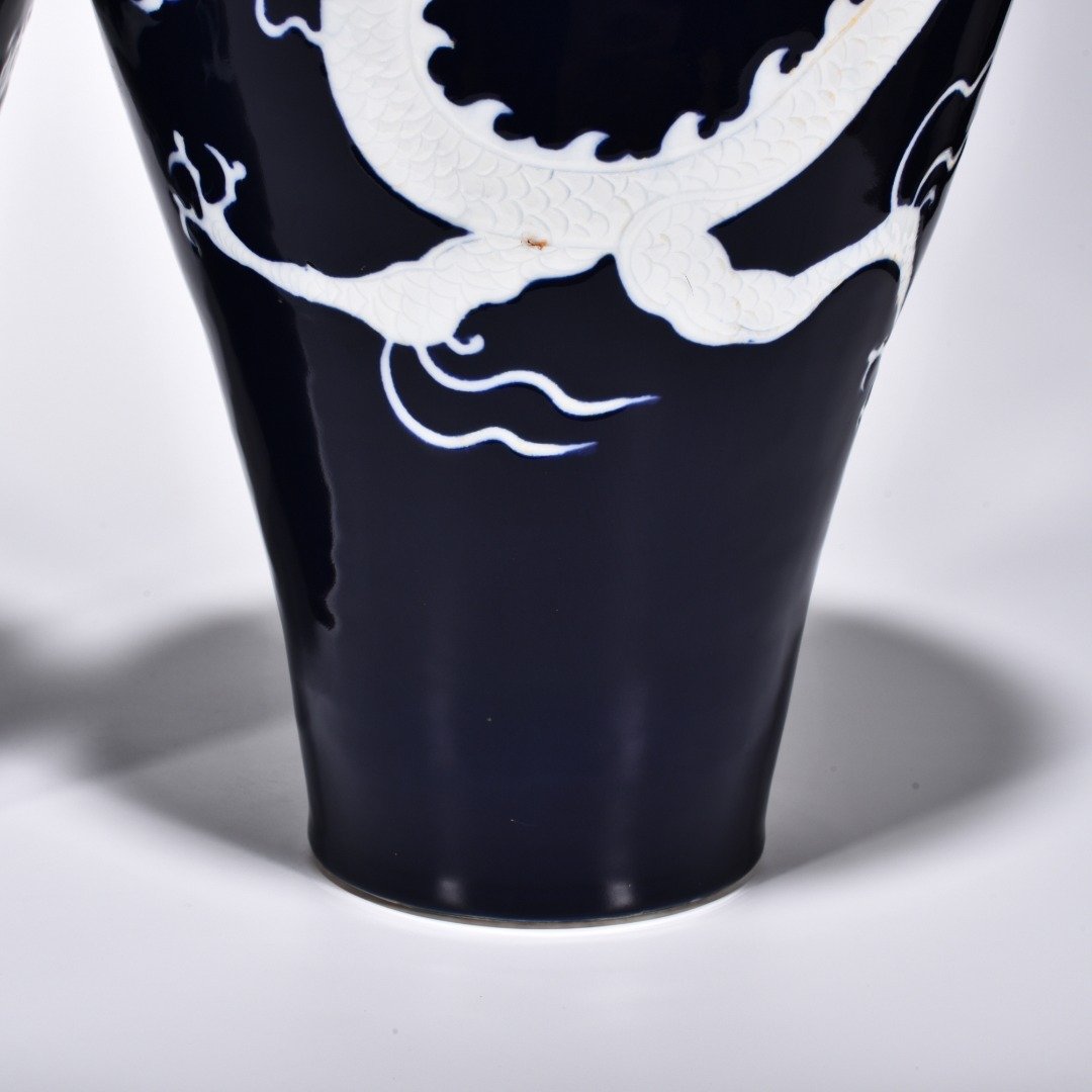 Yuan Dynasty Ji blue glaze white plum vase engraved with cloud and dragon pattern