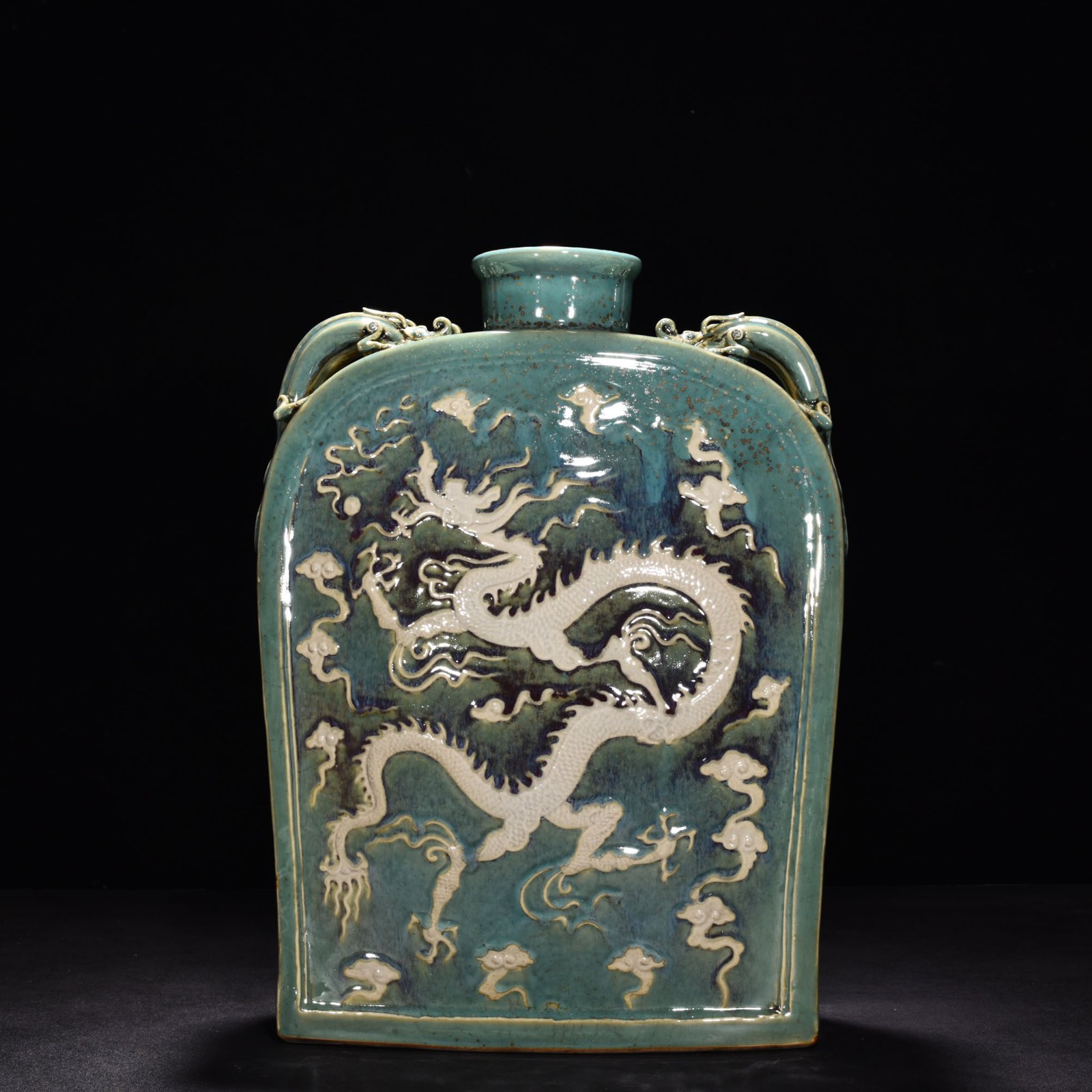 Yuan Dynasty kiln engraved flat bottle with dragon ears and cloud dragon pattern