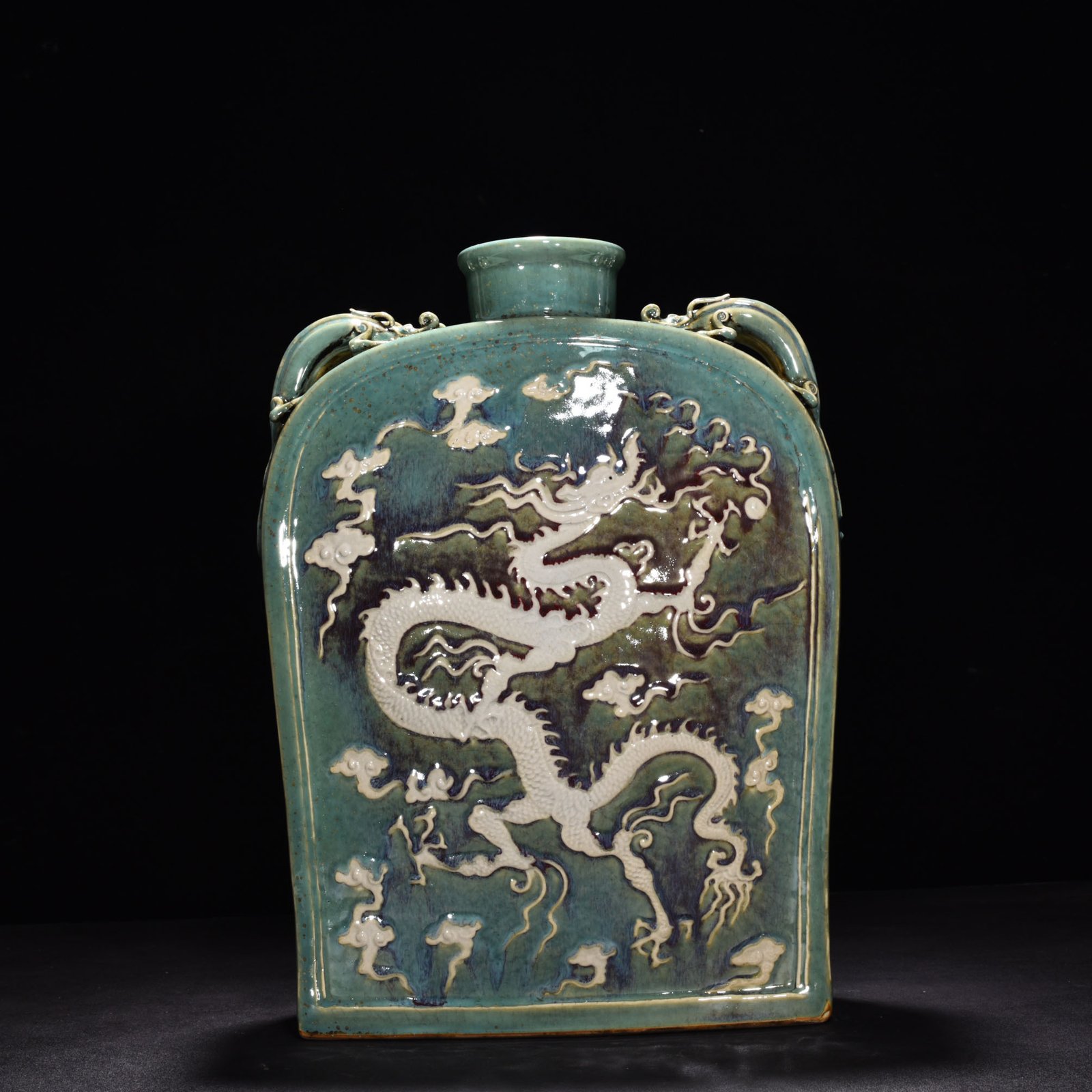 Yuan Dynasty kiln engraved flat bottle with dragon ears and cloud dragon pattern