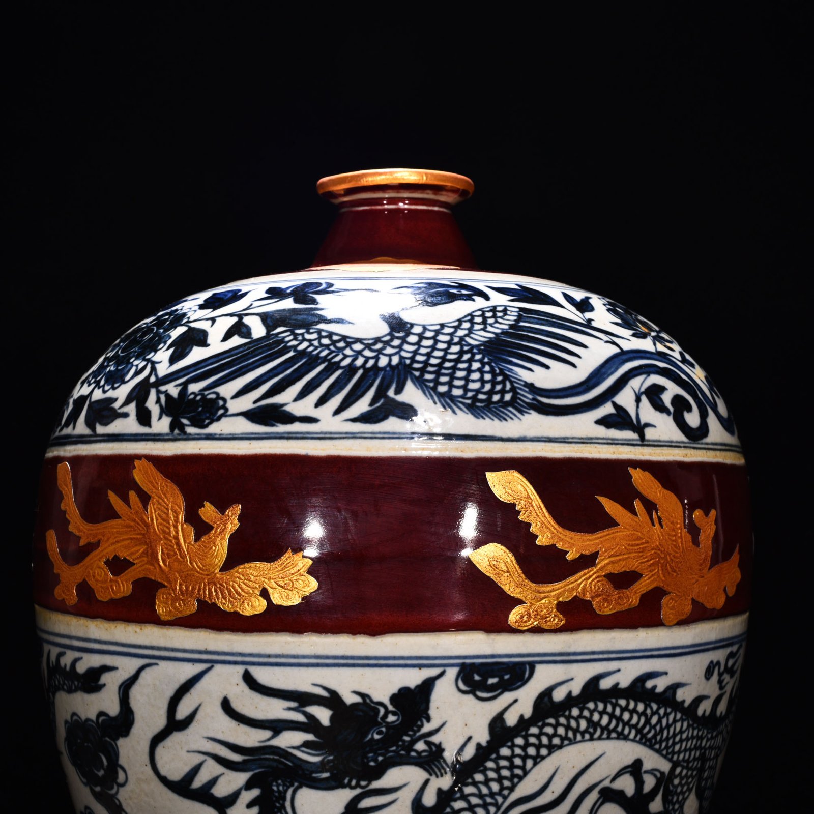 Yuan Dynasty A blue and white gilt plum vase with dragon and phoenix patterns