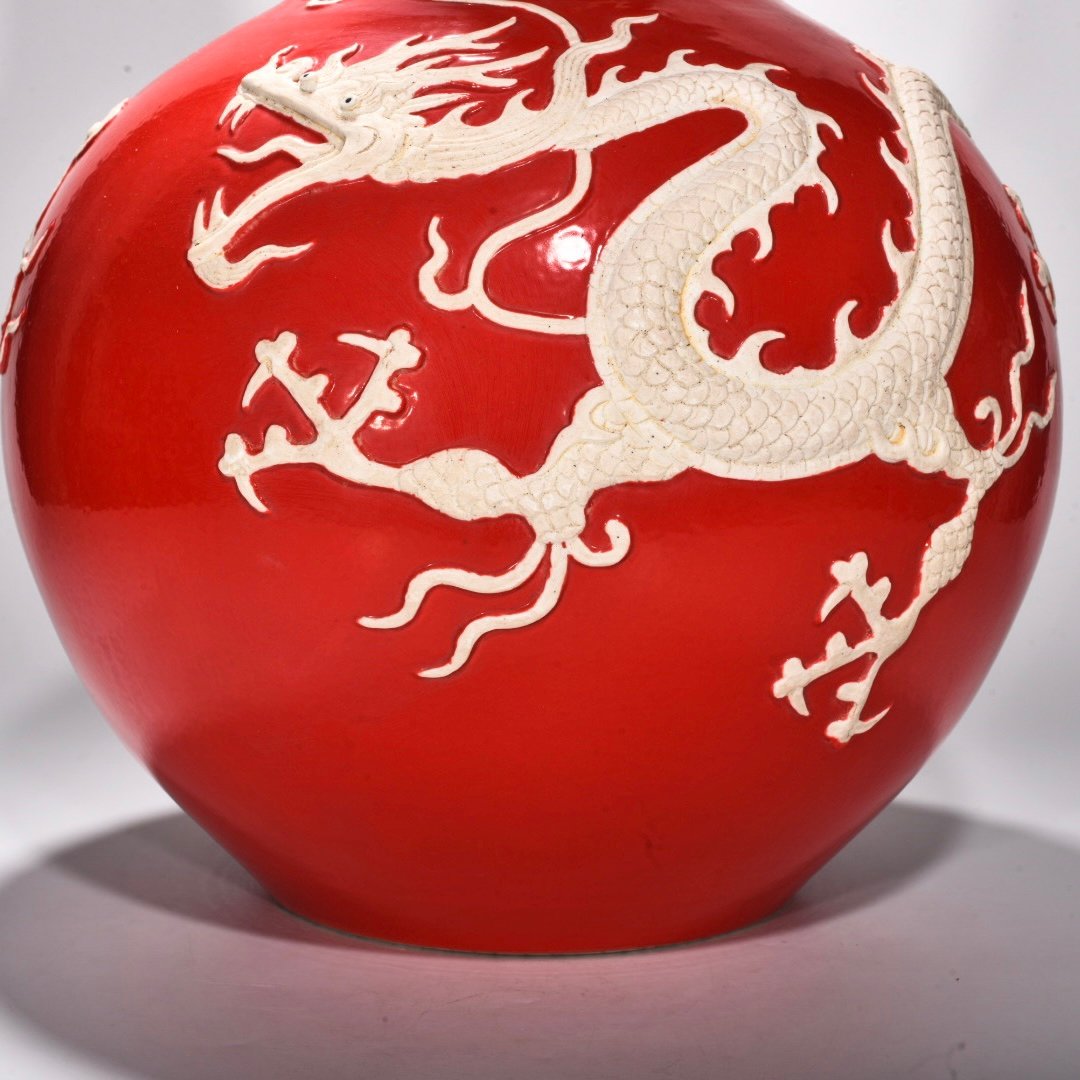 Yuan Dynasty Red glazed celestial sphere vase with cloud and dragon patterns carved