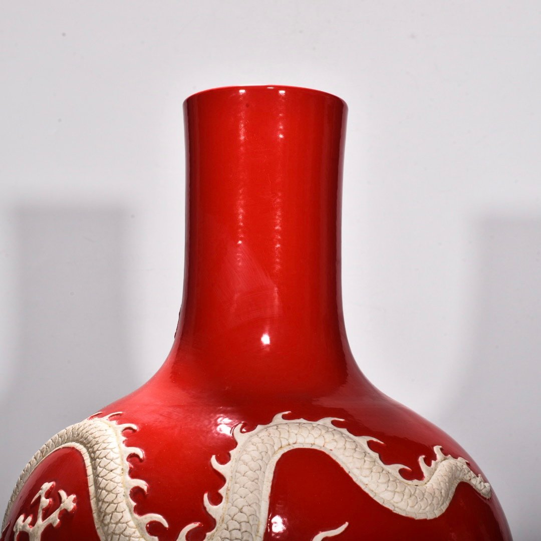 Yuan Dynasty Red glazed celestial sphere vase with cloud and dragon patterns carved