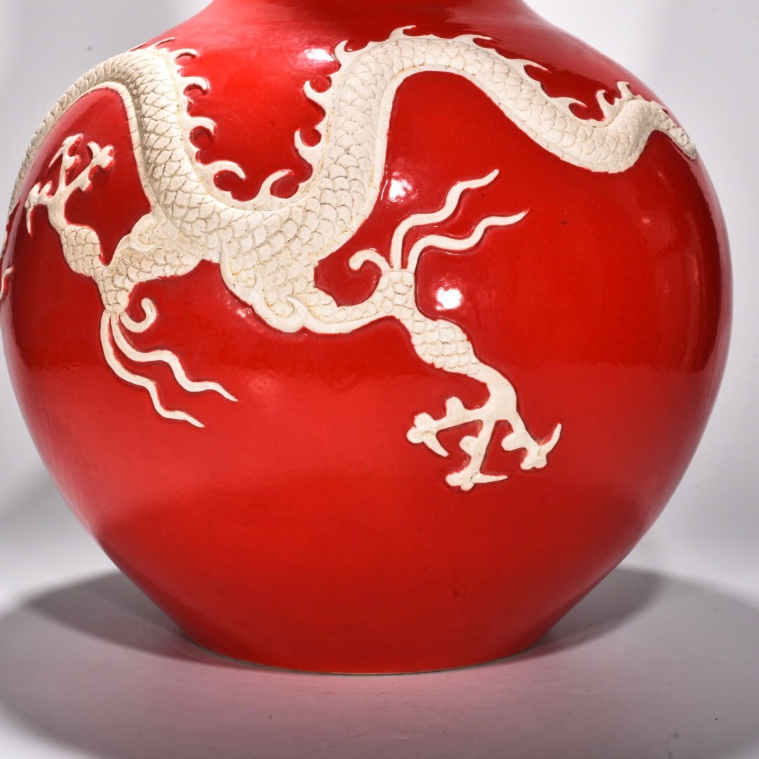 Yuan Dynasty Red glazed celestial sphere vase with cloud and dragon patterns carved