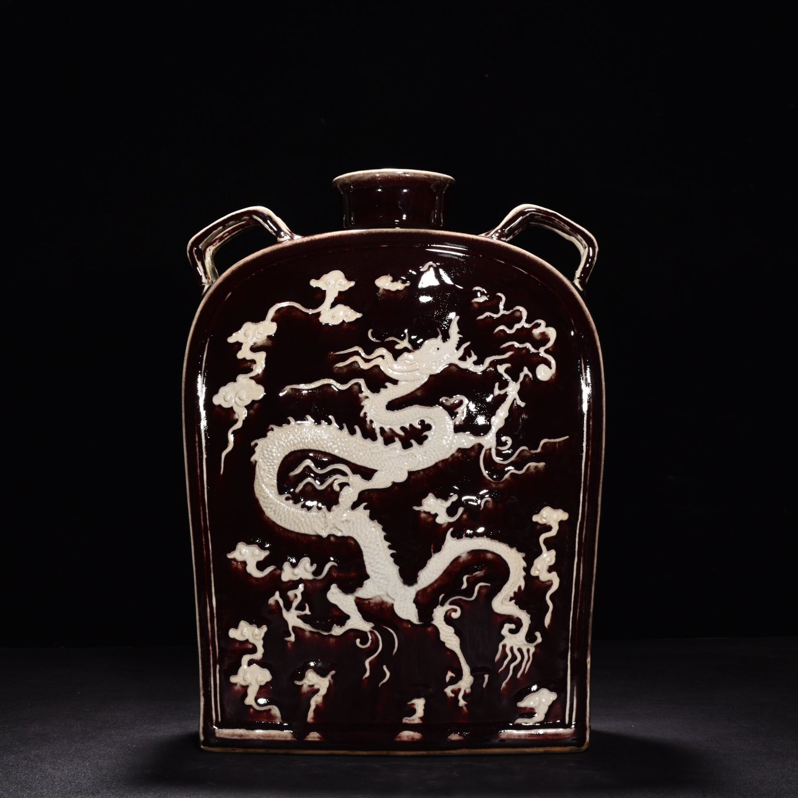Yuan Dynasty red glaze engraved dragon pattern four series flat bottle