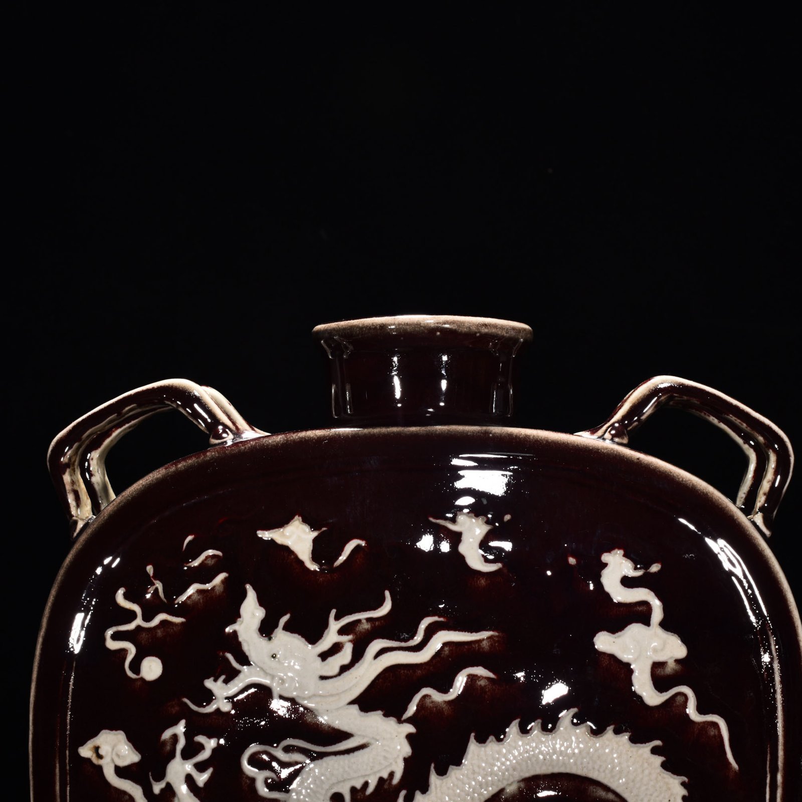 Yuan Dynasty red glaze engraved dragon pattern four series flat bottle