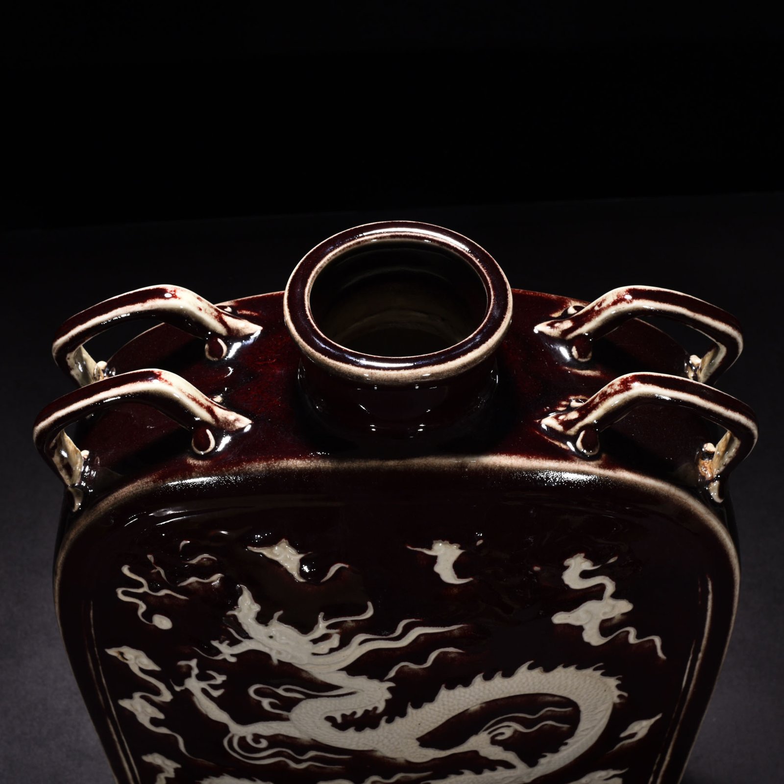 Yuan Dynasty red glaze engraved dragon pattern four series flat bottle