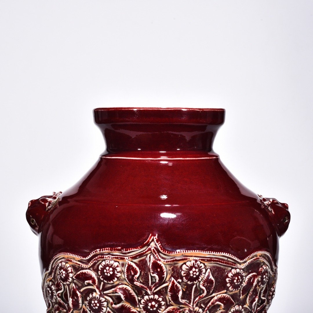 Yuan Dynasty red glaze laminated mandarin duck flower pattern animal ear disc-mouth bottle
