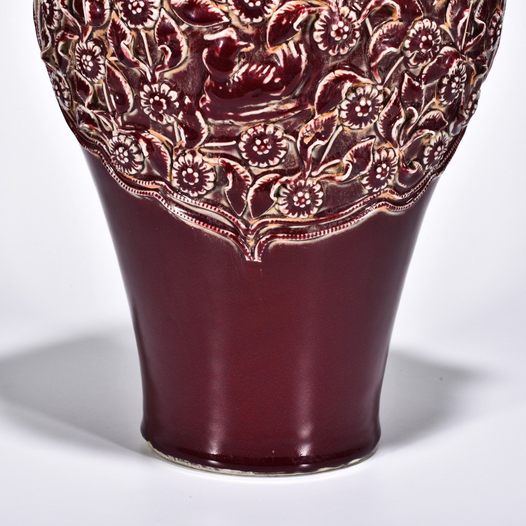 Yuan Dynasty red glaze laminated mandarin duck flower pattern animal ear disc-mouth bottle