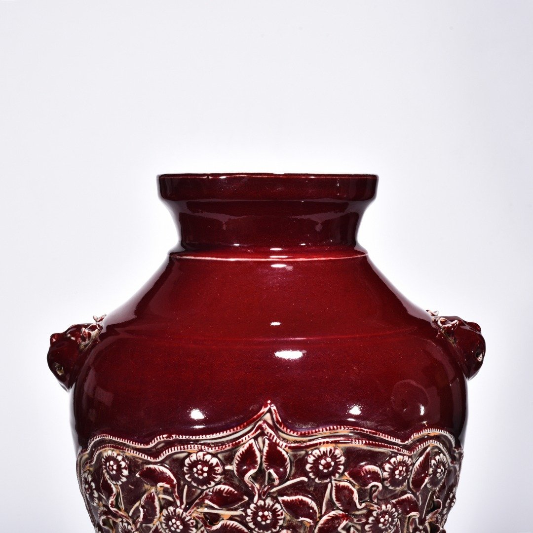 Yuan Dynasty red glaze laminated mandarin duck flower pattern animal ear disc-mouth bottle